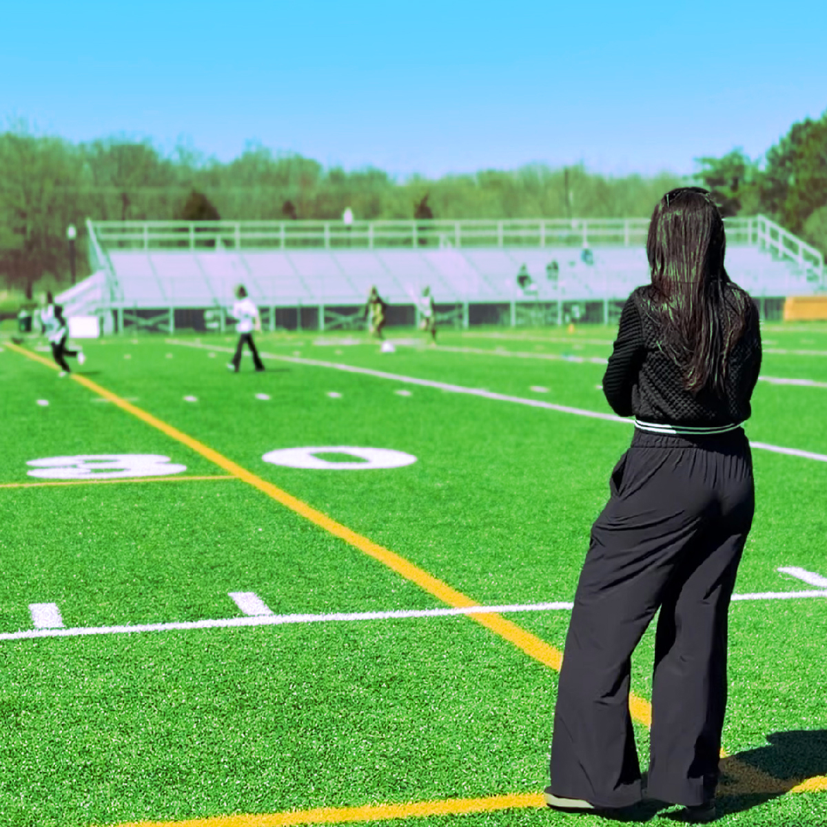 Joni coaching on the field